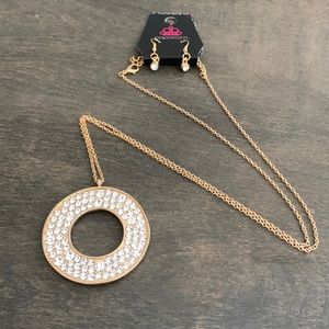 Faux golf long necklace with faux diamonds, matching earrings.